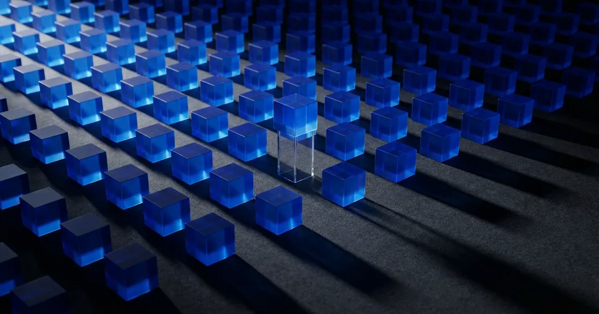 Rows of glowing blue cubes on a dark surface